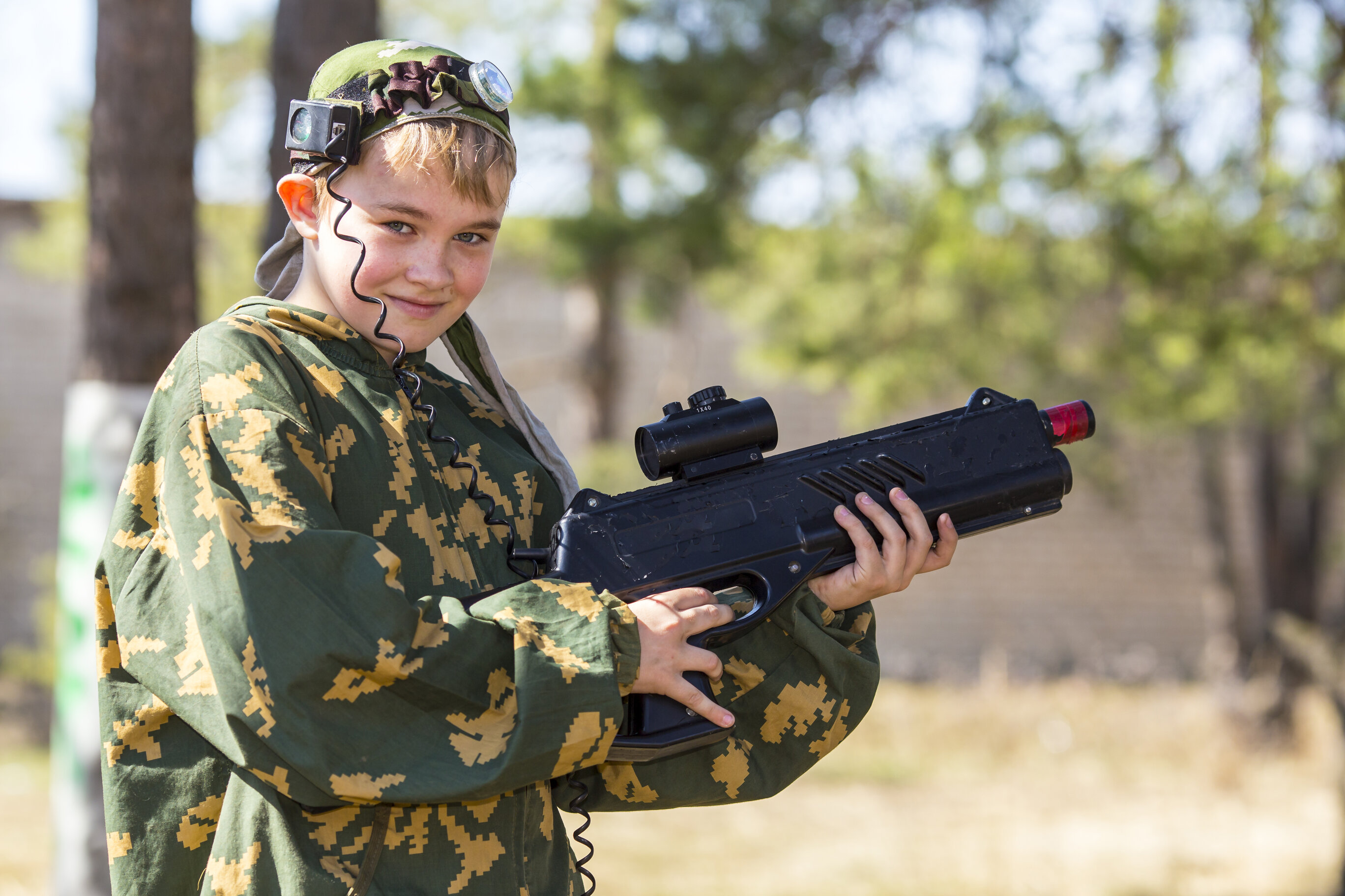 Kid with laser tag gun