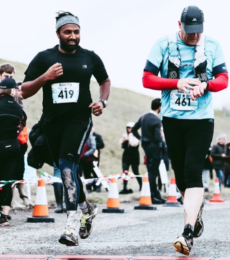 Two men running a marathon