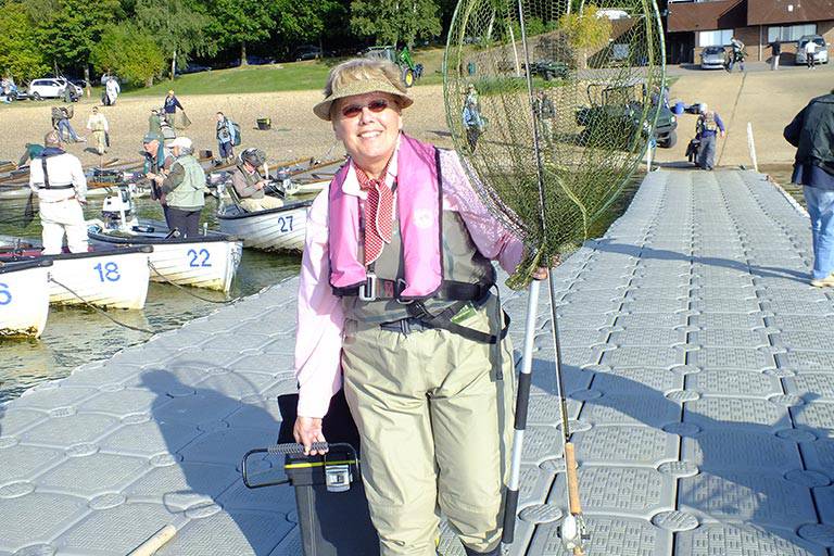 Lady walking to boat