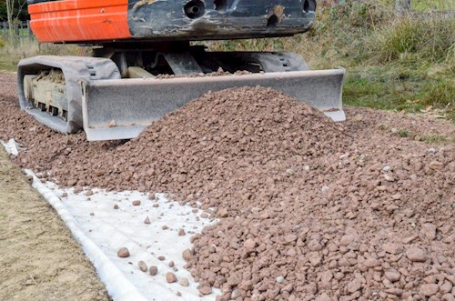 Digger shovelling