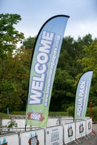 Flag welcoming people to bewl water aquapark