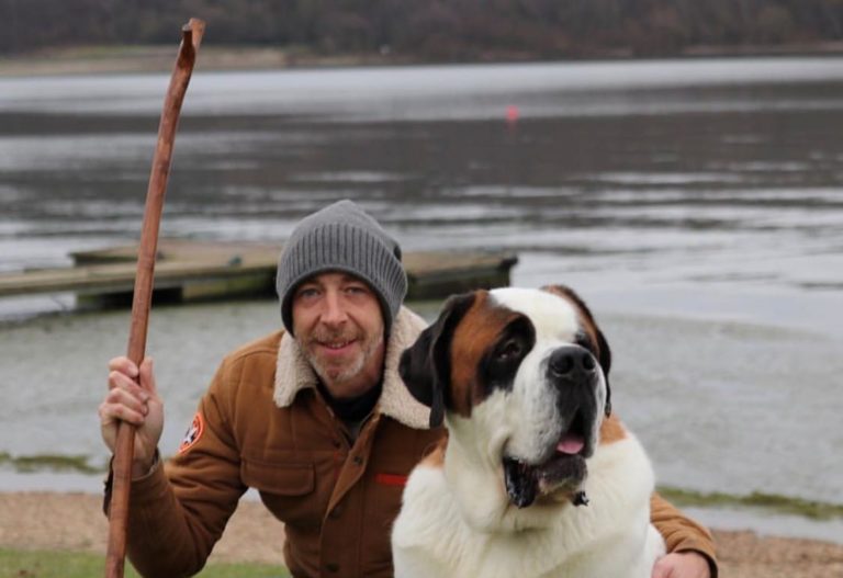 Man with his dog at bewl water