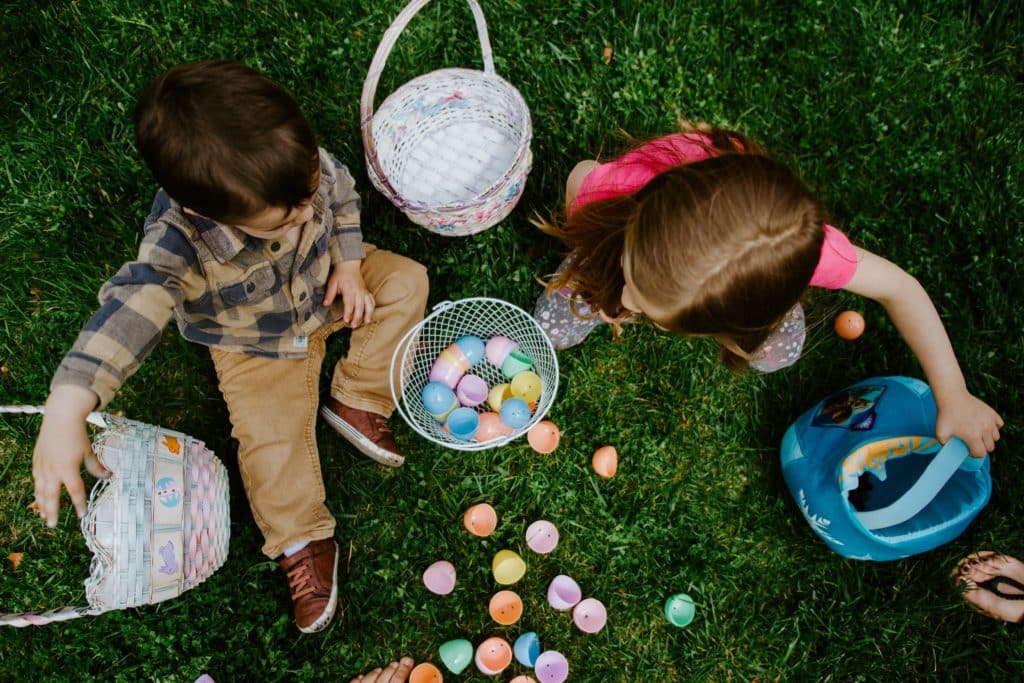 Kids with baskets and easter eggs