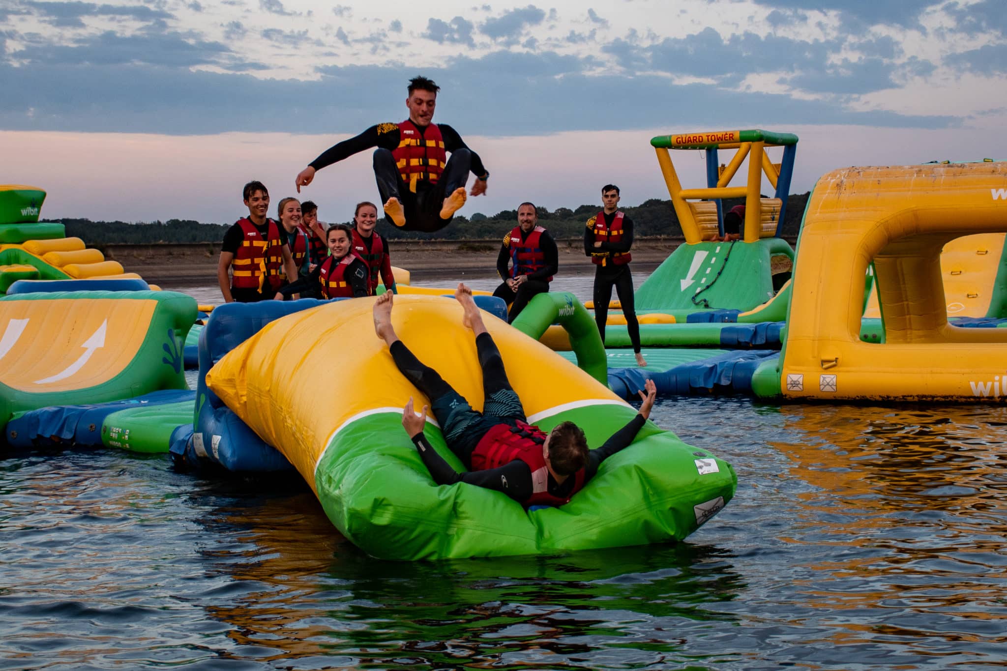 People having fun at the wibit inflatables at bewl water